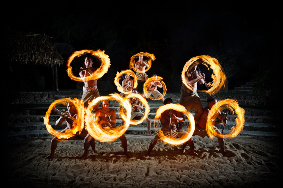 Fire dancers performing at night