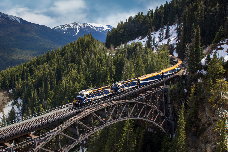 A Rocky Mountaineer train moving on the tracks